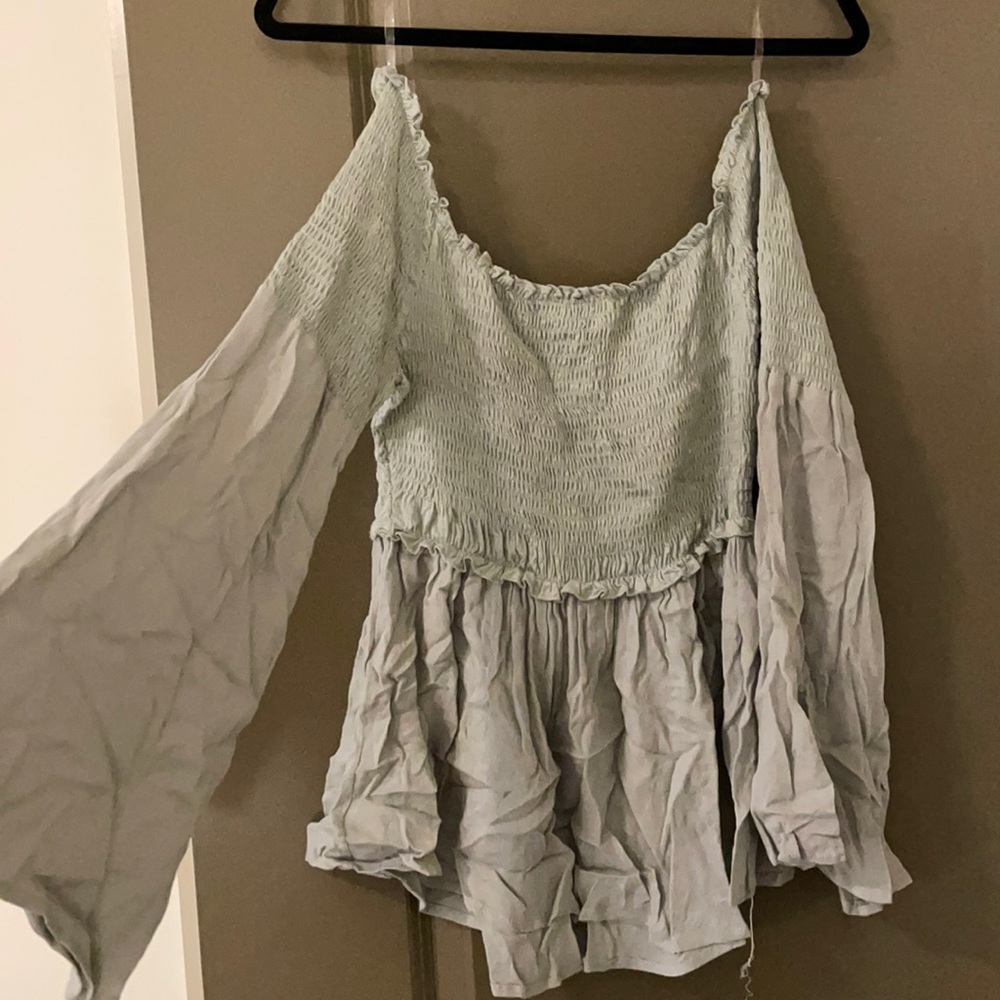 Mint green off the shoulder shirt with flared sleeves